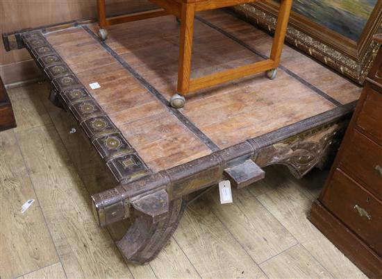 An Indonesian iron-bound hardwood elephant saddle coffee table approx 138 x 133cm